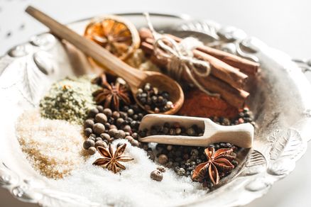 Assorted Indian spices including cumin, coriander, turmeric, red chilli, fennel, mustard, and black pepper — showcasing the wide range of premium Indian spices exported by MerakiAnanta Imports Exports Pvt. Ltd.